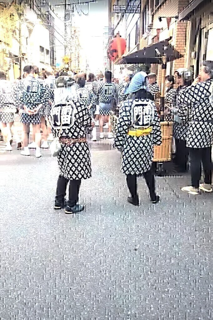 Men in Shinto clothing at Senso-ji